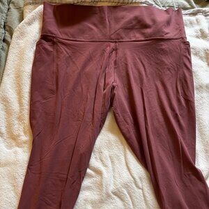 Athleta Salutation Stash Pocket II 7/8 Tight